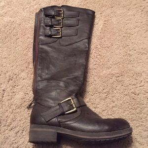 Under the knee, brown boots