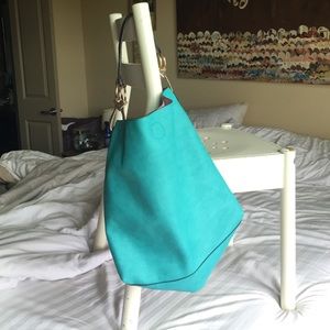 Turquoise, hobo, vegan leather handbag holds all!