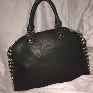 A black studded bag