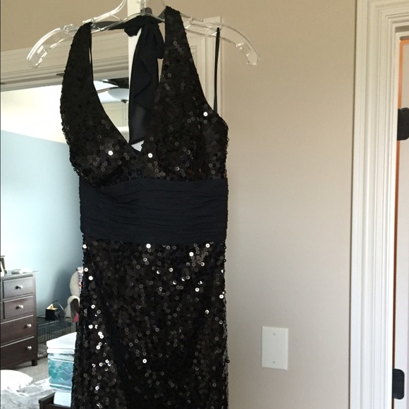 Sequined little black dress