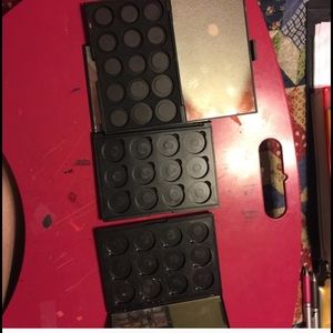 3 eyeshadow palettes and lipstick holder