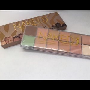 Urban Decay Naked 3 Makeup corrector and cover.