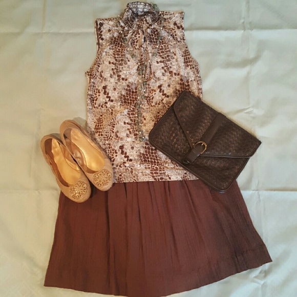 Sleeveless snake print mock neck