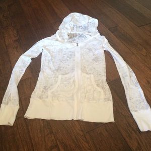 Long sleeve hooded shirt.