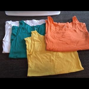4 different colored tank tops 😊