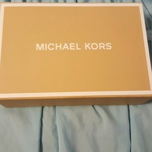 Empty magnetic closure Michael Kors gift box.