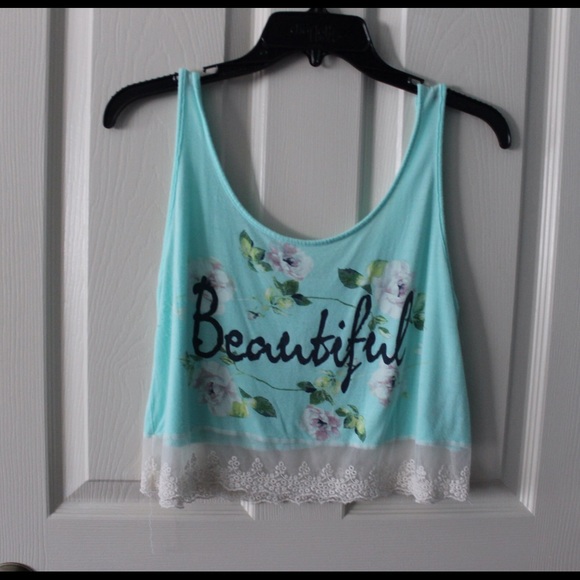 teal tank top that says "beautiful"