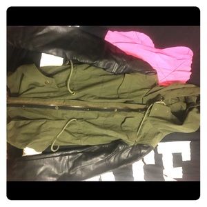 Thigh length jacket with leather arms