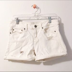 Distressed white American Eagle shorts