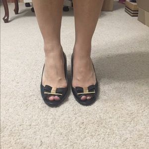 Bandolino black leather peep-toe wedges