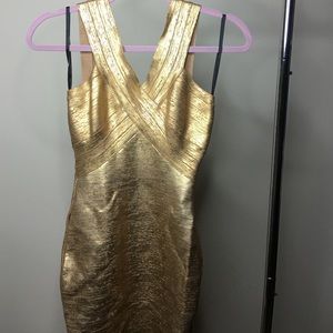 Gold Bebe dress.