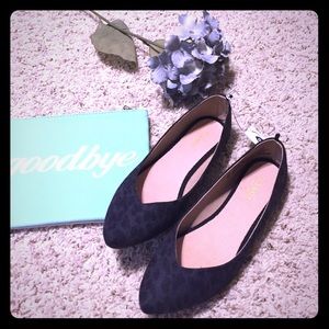 Black pointed flats