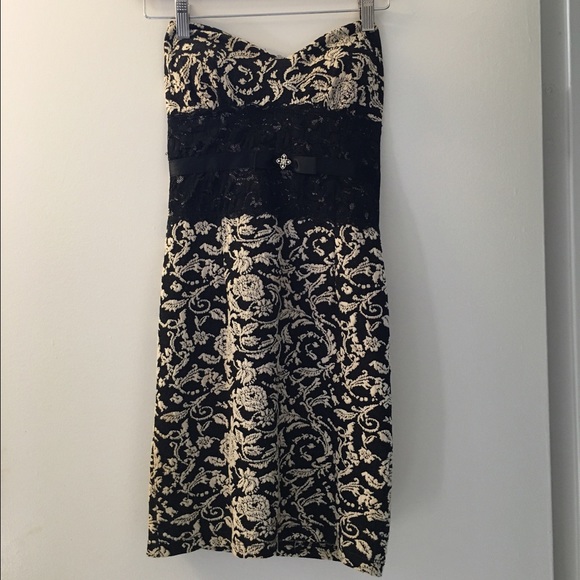 Dresses & Skirts - Holiday Strapless black and cream lace dress.