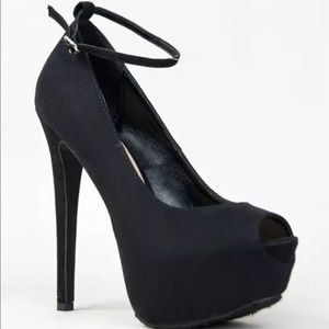 Breckelle's black peep toe ankle strap heels