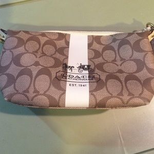 Tan coach handbag