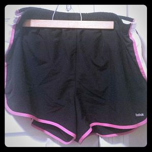 Reebok running shorts pink and black