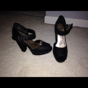 SM New York retro-style peep-tied platforms.