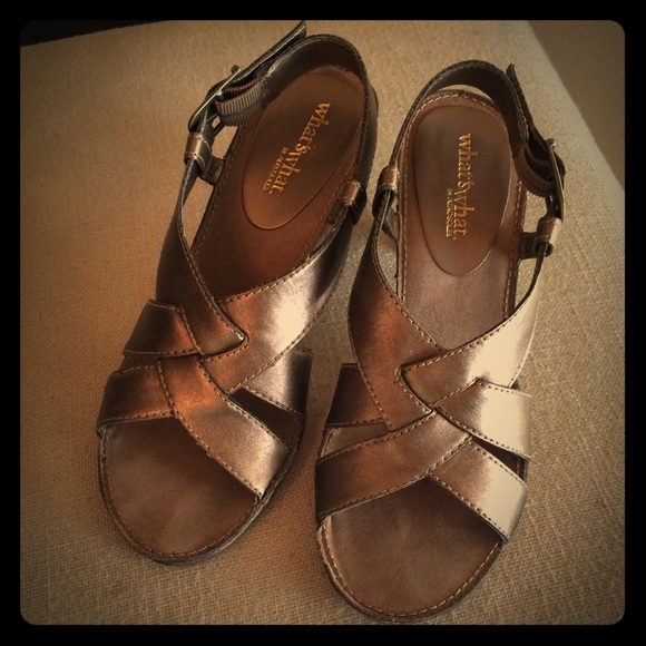 Gently used sandals with about 3 inches heels