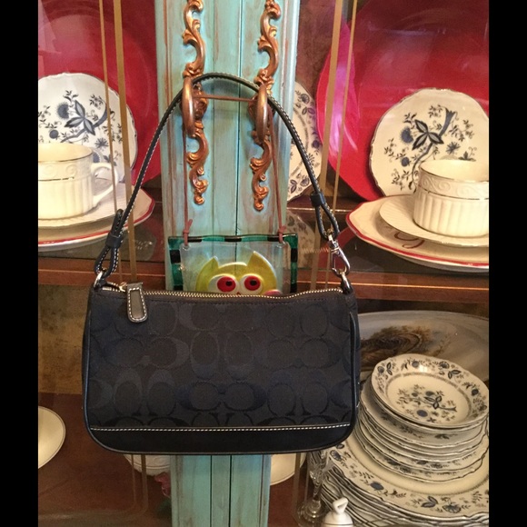 Coach Handbags - 💯 Authentic Coach Wristlet