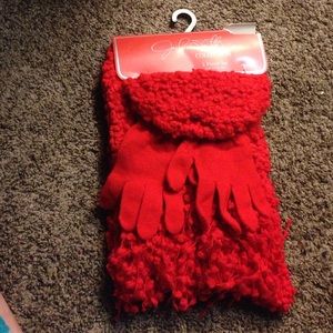 A set of gloves with a scarf and beanie