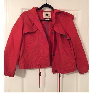 Red rain jacket with chambray detailing