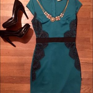 Slim fitting teal and lace dress