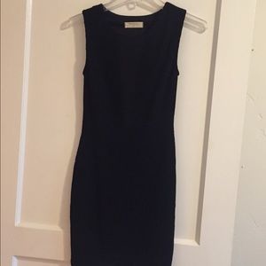 Black sparkle bodycon dress.