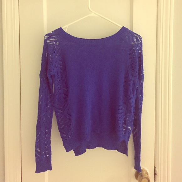 Royal blue sweater with cutout sides and sleeves