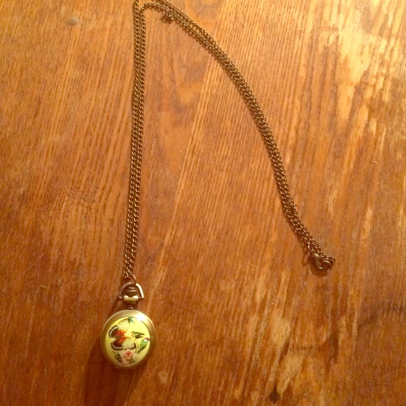 Long necklace with hidden clock