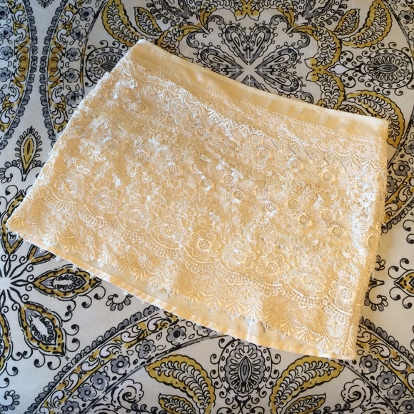 Cream lace mini skirt