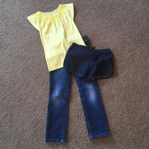 Girls yellow shirt, blue jean shorts and jeans