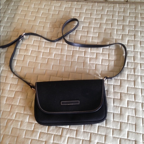 Mini bag or clutch with strap.