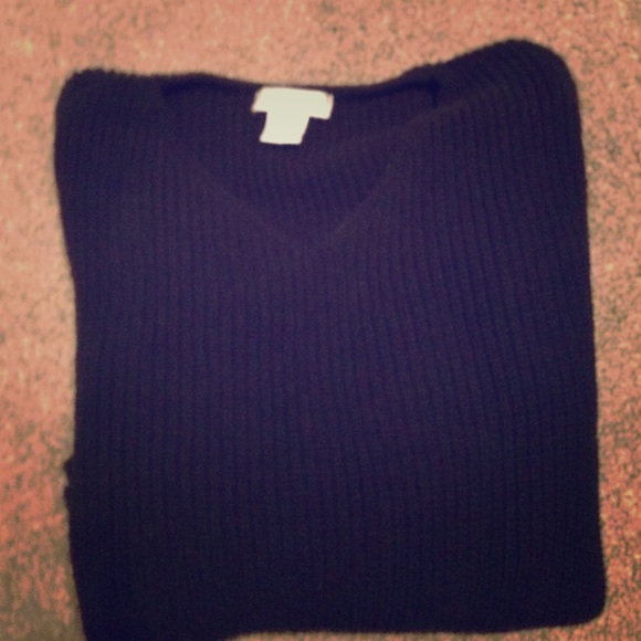 Knit black sweater with bell sleeves