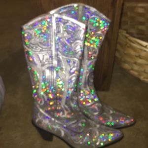 Silver sequenced cowgirl boots.