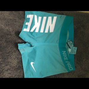 Teal Nike pros