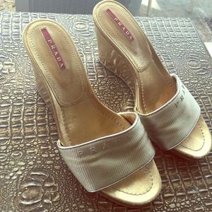 Gold Prada Wedge sandals. Definitely signs of wear