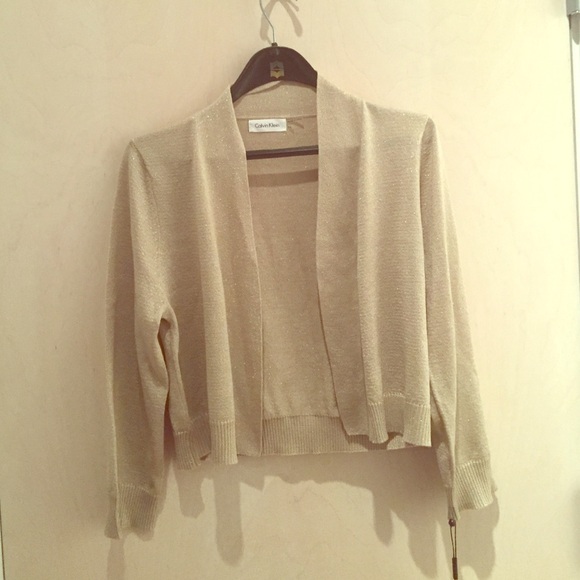 Gold Calvin Klein shrug