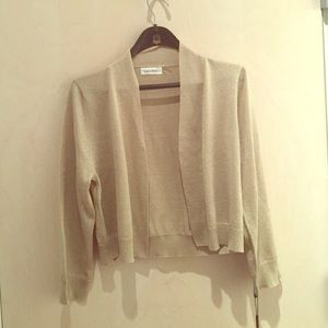 Gold Calvin Klein shrug