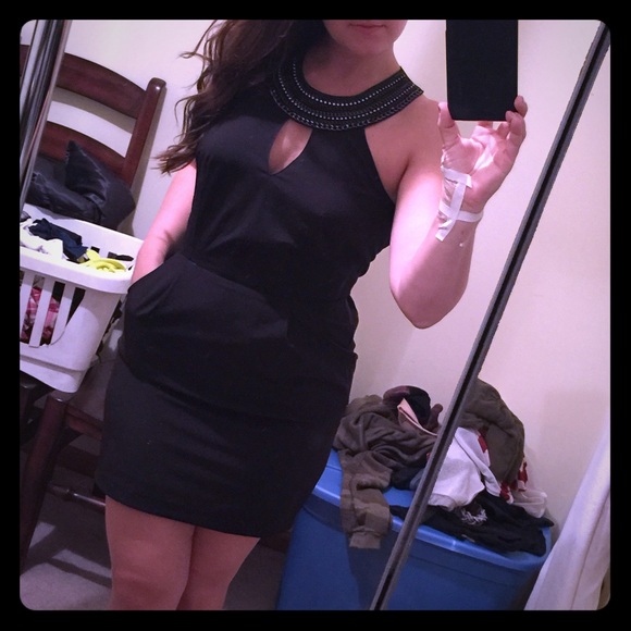 Little black dress with jewel neckline. Sz small.