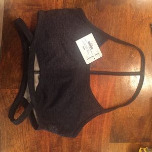 Sports bra  new never worn. Super sexy on!!