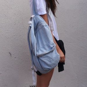 American Apparel light wash denim backpack