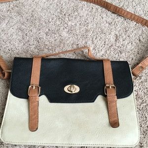 Cute tan/black/off white cross body slightly used