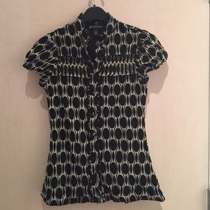 Black and white ruffled blouse