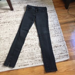 skinny black jeans with zipper bottoms