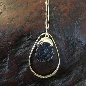 Gray geode on long gold necklace