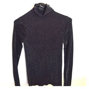 Bebe mock neck top with gold and black stitching