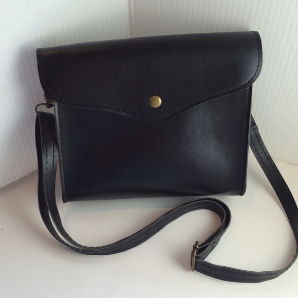 Black leather messenger bag. NWOT 7"x8"x2"