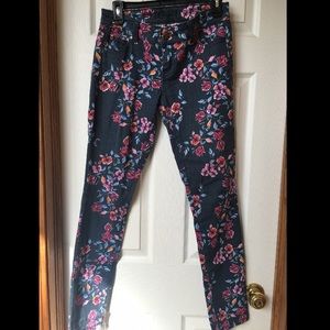 Gray skinny jeans w/ colorful flowers