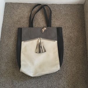 Carlos Santana purse