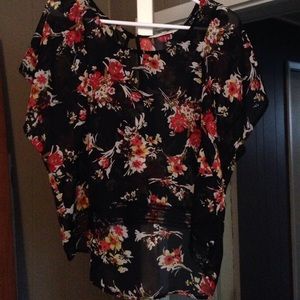 Floral design shirt.